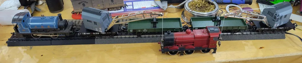 A recreation of a scene from Thomas the Tank Engine where James is lifted by two cranes.